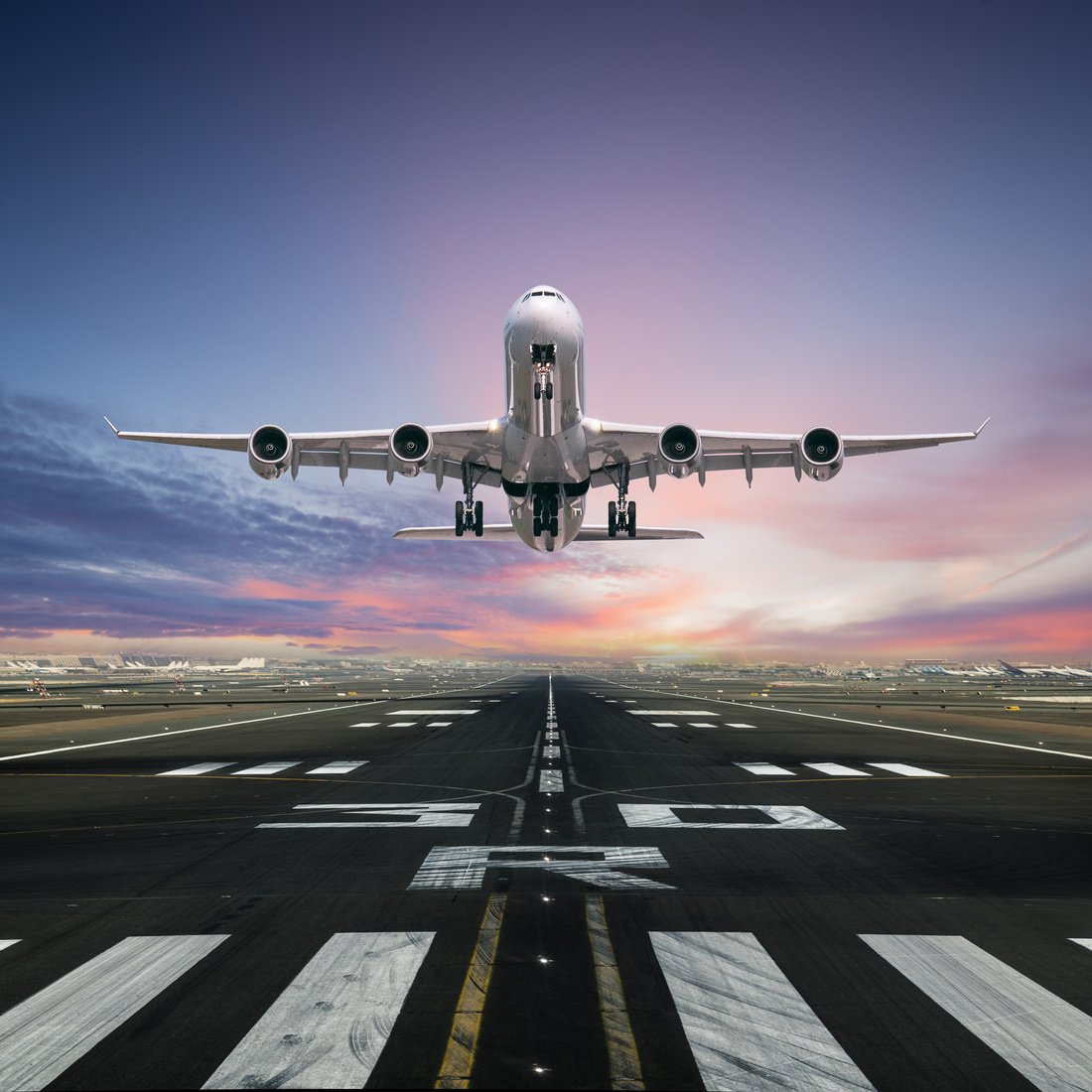 Airplane taking off from the airport runway